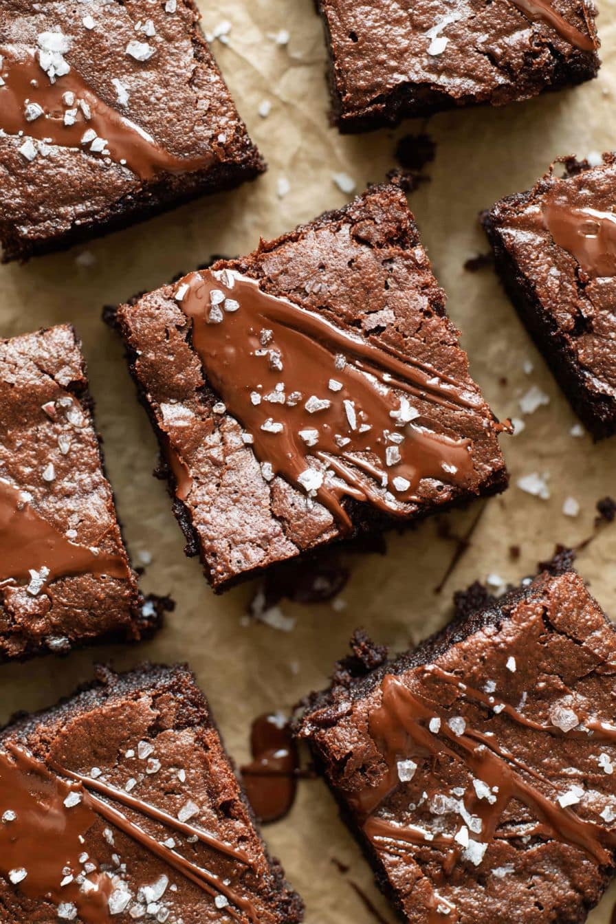 Protein Brownies That Taste Like Fudge and Keep You Full Longer 2 Top-down view of chocolate protein brownies with melted chocolate and sea salt