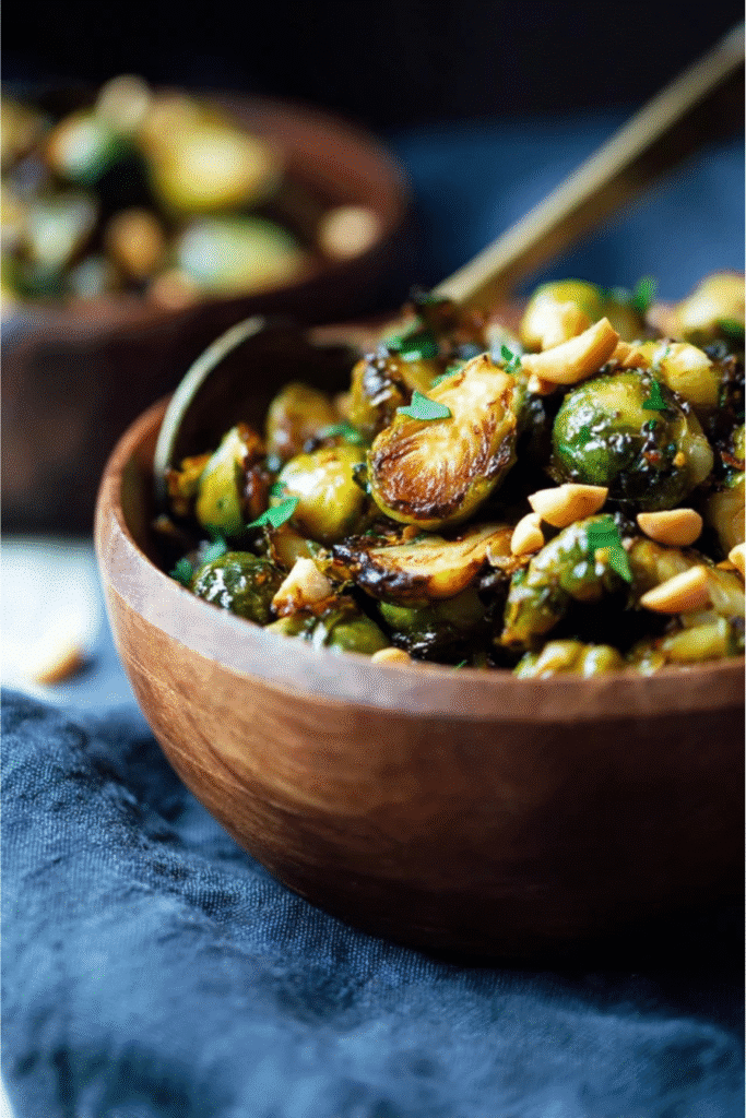 Kung Pao Brussel Sprouts – A Spicy, Crispy Twist You’ll Crave Again and Again 1 Kung Pao Brussels sprouts served in a wooden bowl with garnish