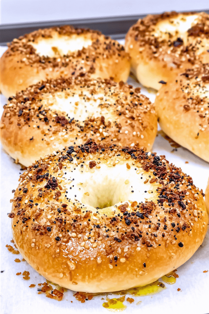 Low Carb Bagels Recipe – A Perfect Start to the Day 3 Golden low carb bagels with everything seasoning fresh from the oven