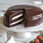 Finished Keto Ding Dong Cake with glossy ganache and cream layers